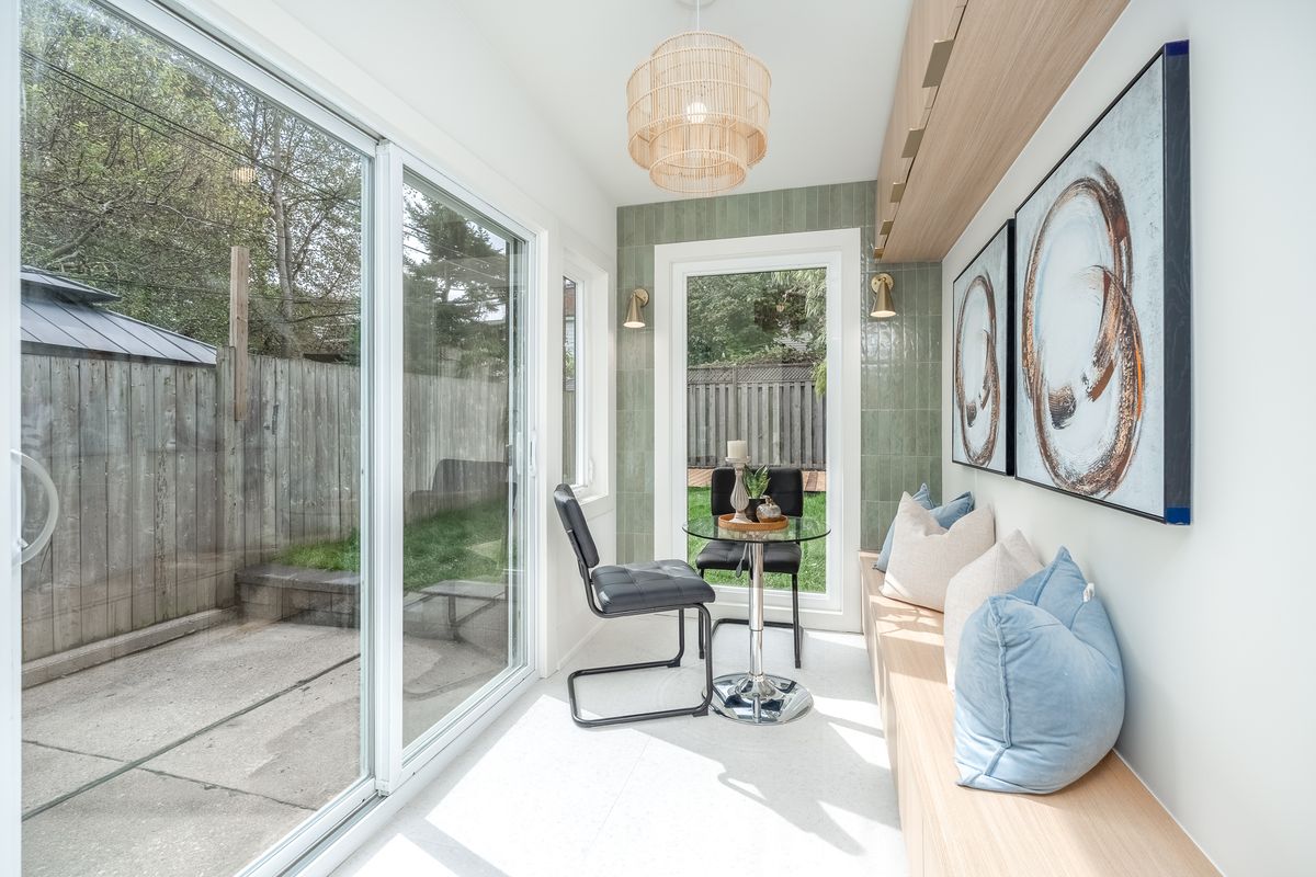 356 Woodfield Rd., sunroom off the kitchen, opening to the yard